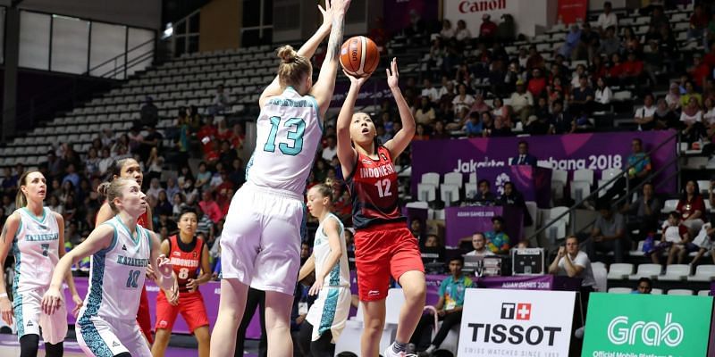 Enter captionAction from Philippines and Japan Basketball on Day 13