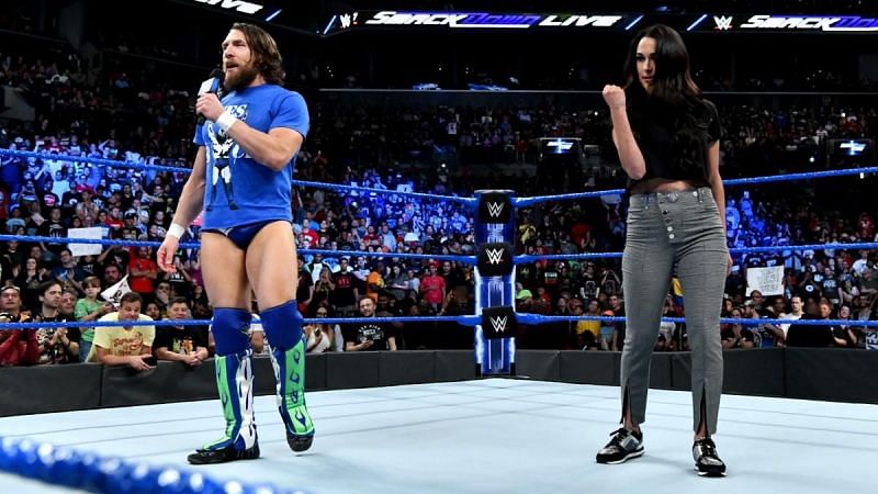 The Miz and Maryse were ejected from the ring by Daniel Bryan and Brie Bella