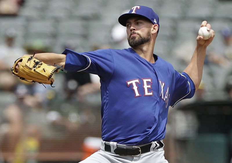 Rangers go deep twice to back Minor in 4-2 win over A's