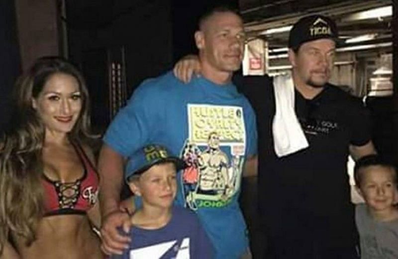 WWE Superstar John Cena (in blue) appears to be a spitting image of Mark Wahlberg (right)