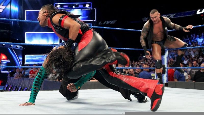 ... but Shinsuke Nakamura strikes from behind and kicks Jeff in the back of the head.