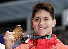 Singapore's Schooling ends golden streak for China and Japan
