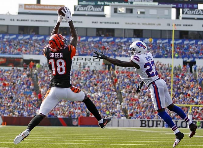 Dalton enjoys warm welcome in Bengals' 26-13 win over Bills