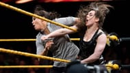 Nikki Cross attacking the current NXT Women's Champion Shayna Baszler
