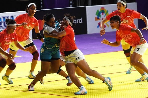Indian Women&#039;s Kabaddi team in action against Sri Lanka