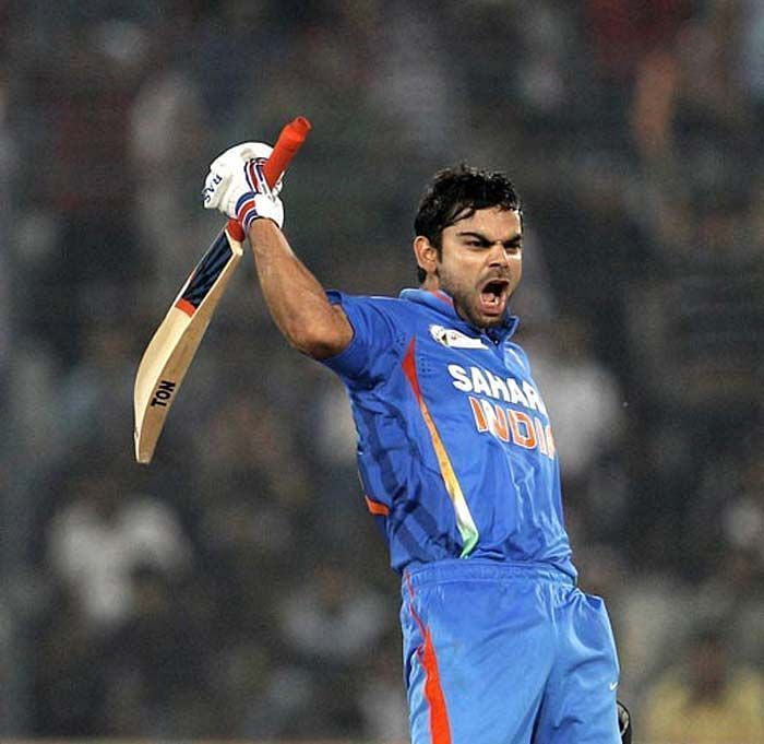 Kohli celebrates his century vs Pakistan, 5th Match, Asia Cup at Mirpur, Dhaka on 18 March 2012.