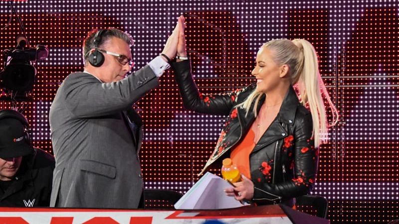 Renee Young gave Michael Cole a high-five joining him and Corey Graves at the commentary desk