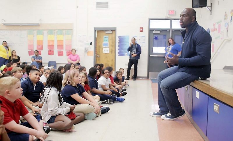 Titus O&#039;Neil speaking to and mentoring the next generation.