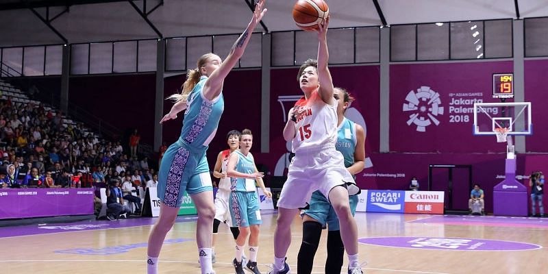 Enter captionAction from Unified Korea and Thailand Basketball at the Asian Games 2018 on day 11