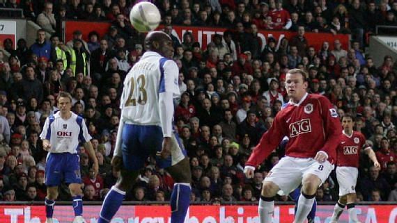 Rooney floats one over David James