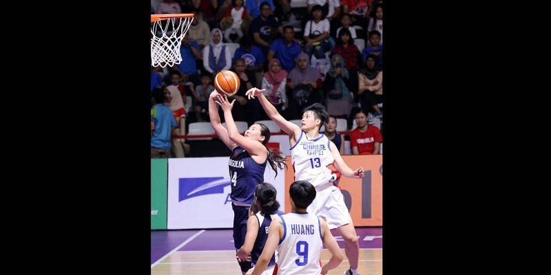Enter caAction from Unified Korea and Thailand Basketball at the Asian Games 2018 on day 11