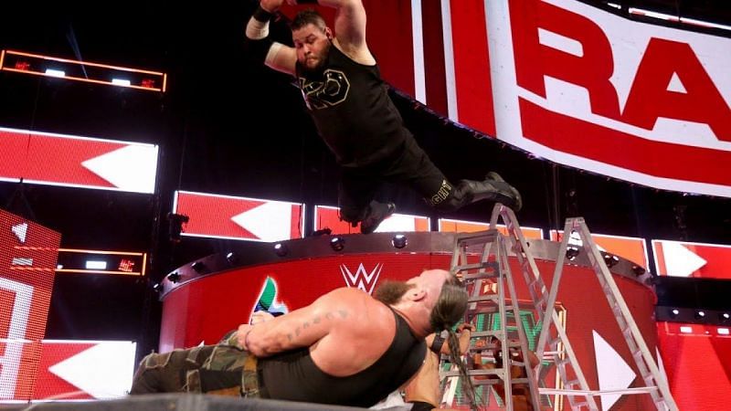 Image result for wwe kevin owens frogsplash to strowman