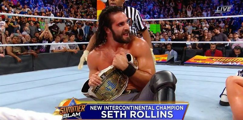 Image result for wwe summerslam rollins wins ic title
