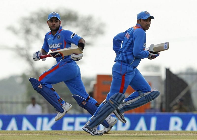 Virat Kohli with Sehwag during a game