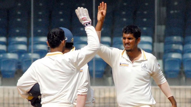 Malolan Rangarajan celebrates after taking a wicket