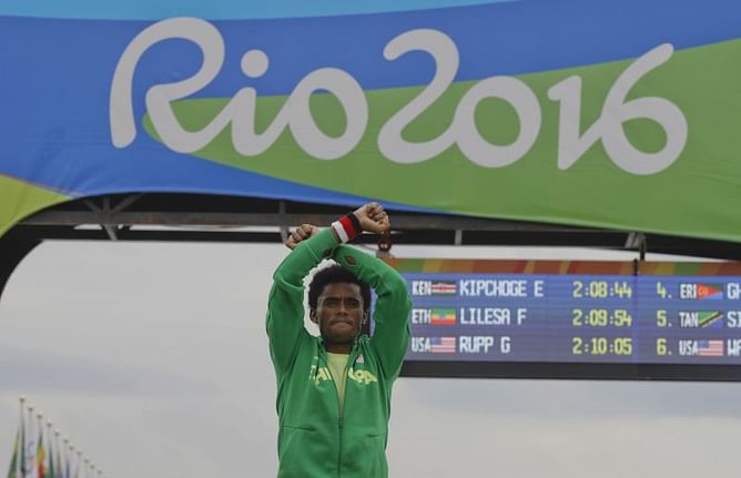 Ethiopian runner who protested at Olympics invited home