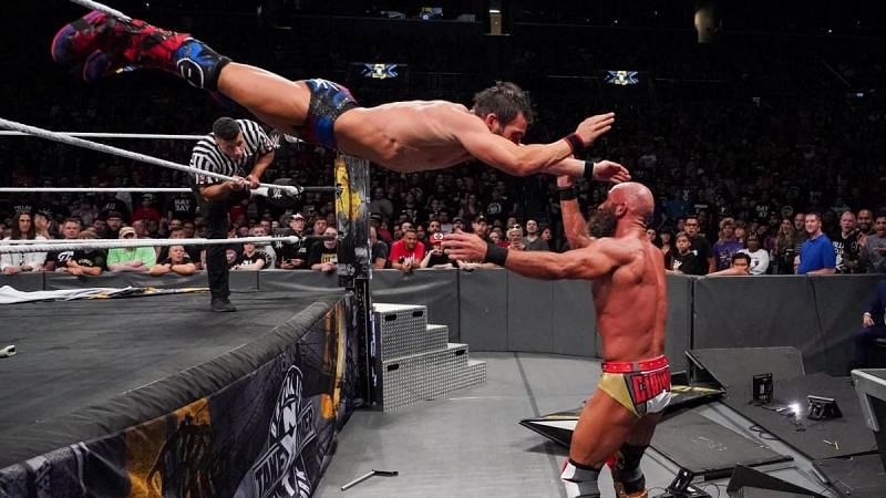 Johnny Gargano dived out onto Tommaso Ciampa 
