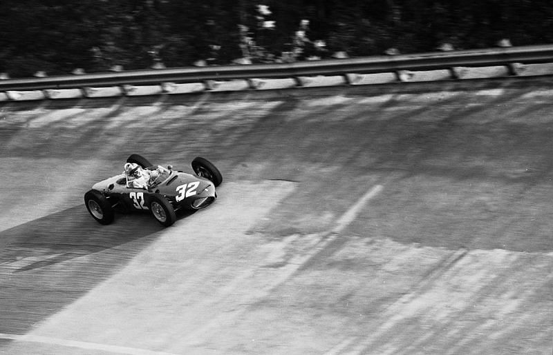 Phil Hill in a Ferrari over the old banking track in 1961