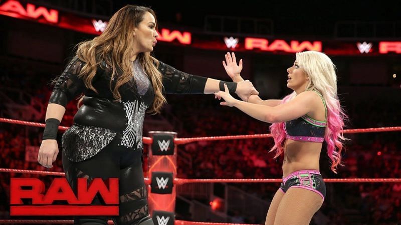 Alexa Bliss tangles with UFC legend Rousa Rousey.