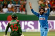 Ravindra Jadeja is celebrating after taking Mushfiqur's wicket