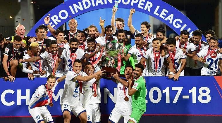 Chennaiyin FC players celebrate after lifting the trophy of ISL 2017-18