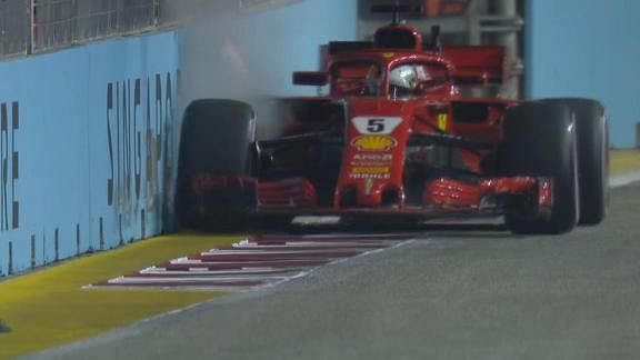 Vettel&#039;s right rear brushing the barriers during FP2