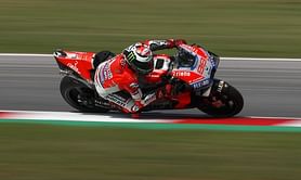 Lorenzo takes San Marino pole in record lap, Marquez crashes