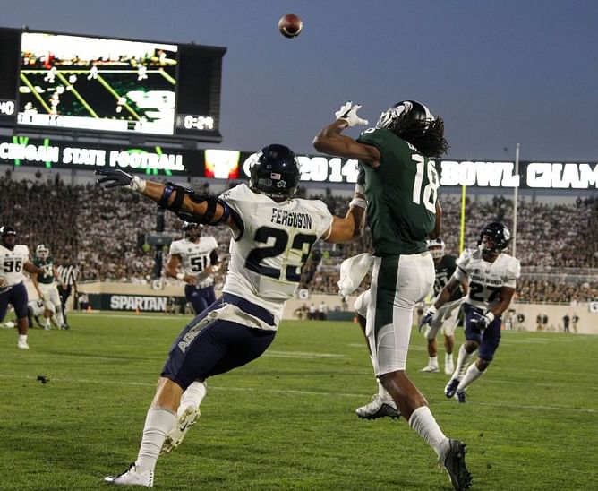 No. 11 Michigan State rallies to beat Utah State 38-31