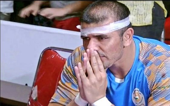 Indian Kabaddi team captain Ajay Thakur about to break into tears during the Iran vs India final at Asiad