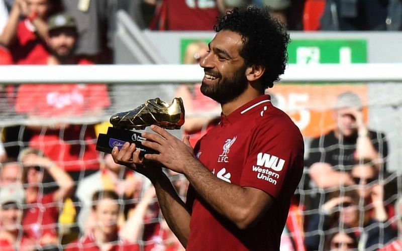 Salah poses with the Golden Boot for the 2017/18 season.