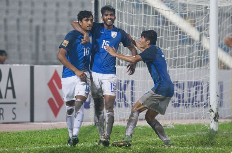 Sumeet Passi (left) celebrates after scoring the 3rd goal for India. 