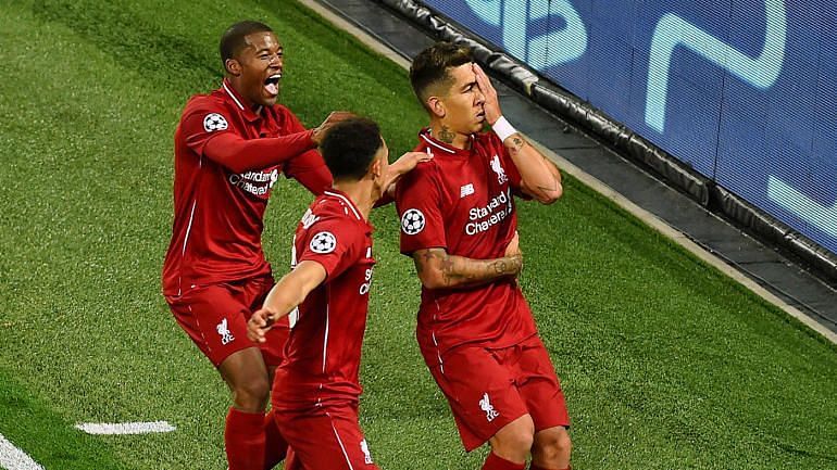 Roberto Firmino celebrating his late winner against PSG.