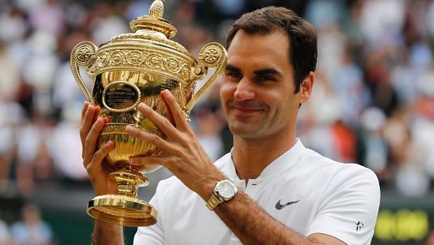 Federer with the WImbledon Trophy