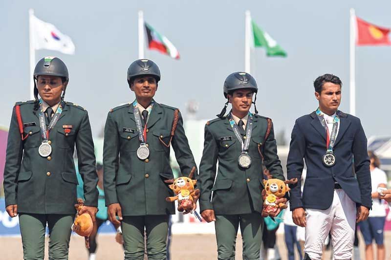 the Indian men&acirc;s team of Ashish Malik, Jitender Singh, Mirza and Rakesh Kumar too came home with silver after scoring 121.30 in the finals