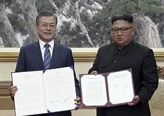 The Latest: Koreas agree to seek to co-host 2032 Olympics