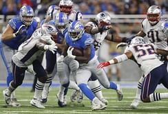 A rushing barrier finally falls for Lions against Patriots