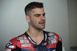 Moto2 rider's contract terminated after pulling rival's brake lever