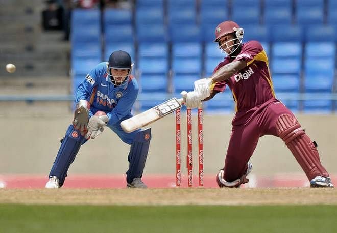 Image result for Andre Russell - 92*(64 balls) vs India, 2011
