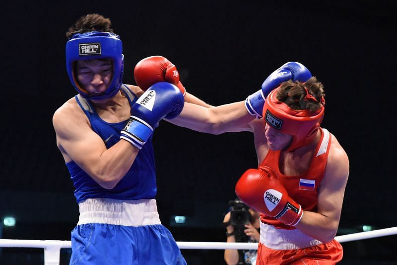 Nurbek of Kazakhstan in Blue facing off against Teterev of Russia (Image Courtesy: AIBA)