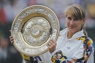 Steffi Graf with her Wimbledon trophy