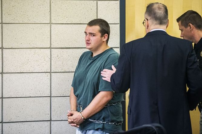 Relatives of Iowa man charged in golfer's death 'devastated'