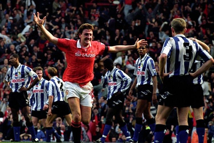 Steve Bruce elated after scoring the goal that won United the first Premier League title