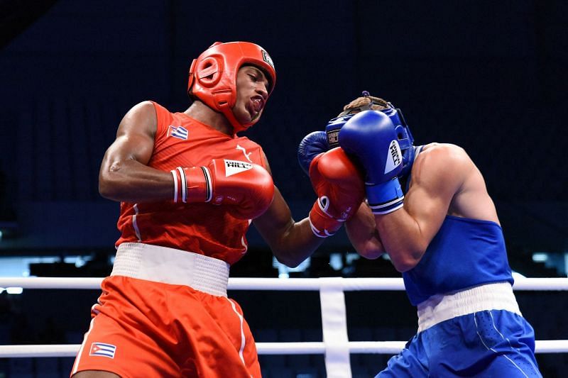 Iribar of Cuba in Red got Popov of Russia flush on the face with a left Uppercut (Image Courtesy: AIBA)