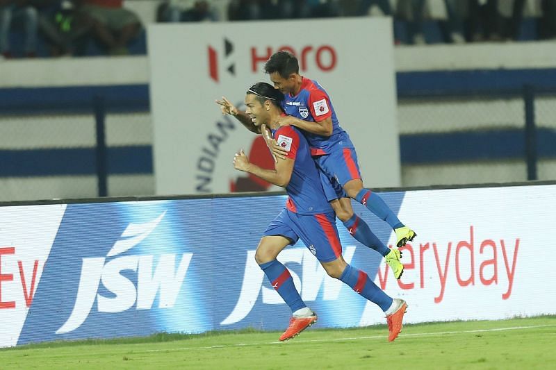 Miku celebrating after opening the scoring. 