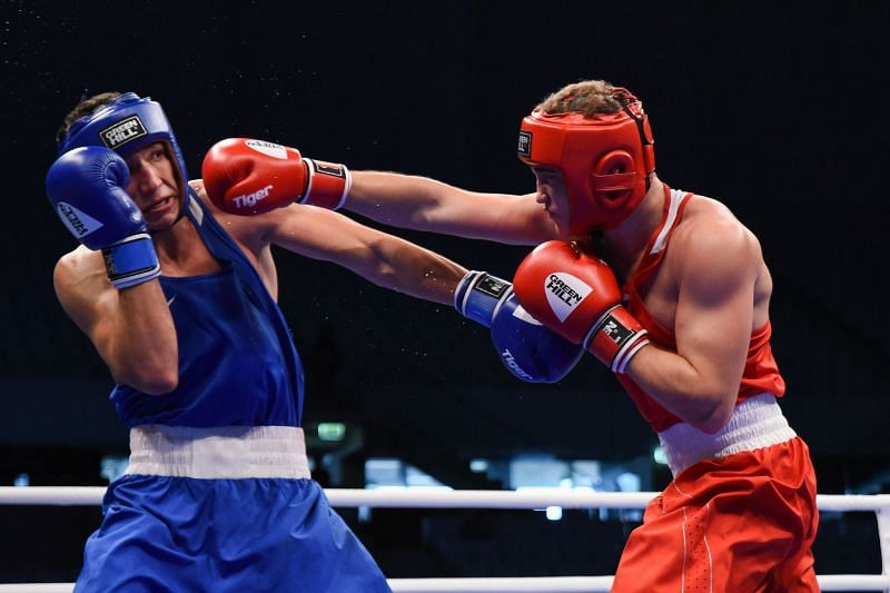 Kolesnikov of Russia in Red in action against Sagyndyk of Kazakhstan in Blue (Image Courtesy: AIBA)