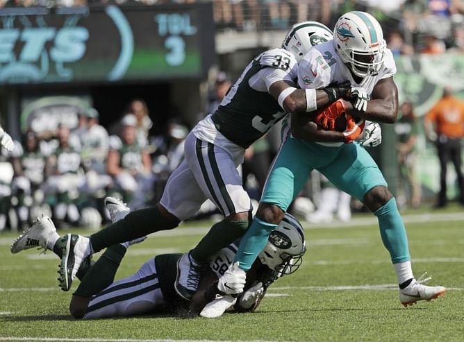 Gore, Dolphins top Darnold, mistake-prone Jets 20-12