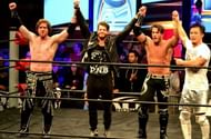 Kushida (far right) alongside The Motor City Machine Guns and Matt Sydal