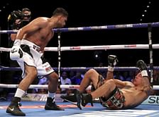 Amir Khan recovers to beat Samuel Vargas on points