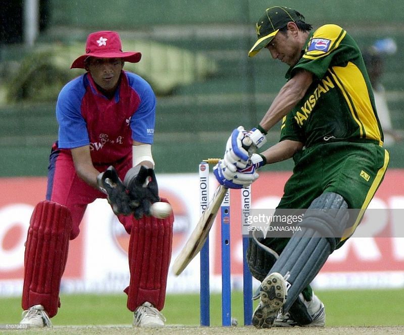 Younis plays a shot against Hong Kong 