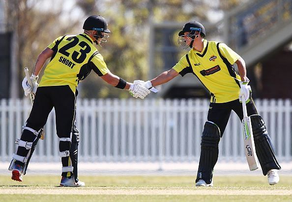 D&#039;Arcy Short shaking hands with his partner